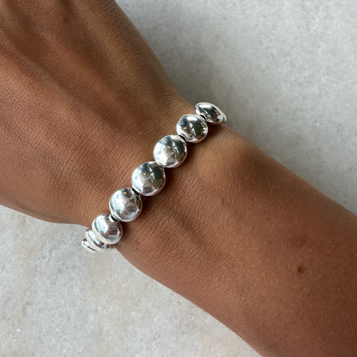10 MM Stretch Flat Bead Bracelet