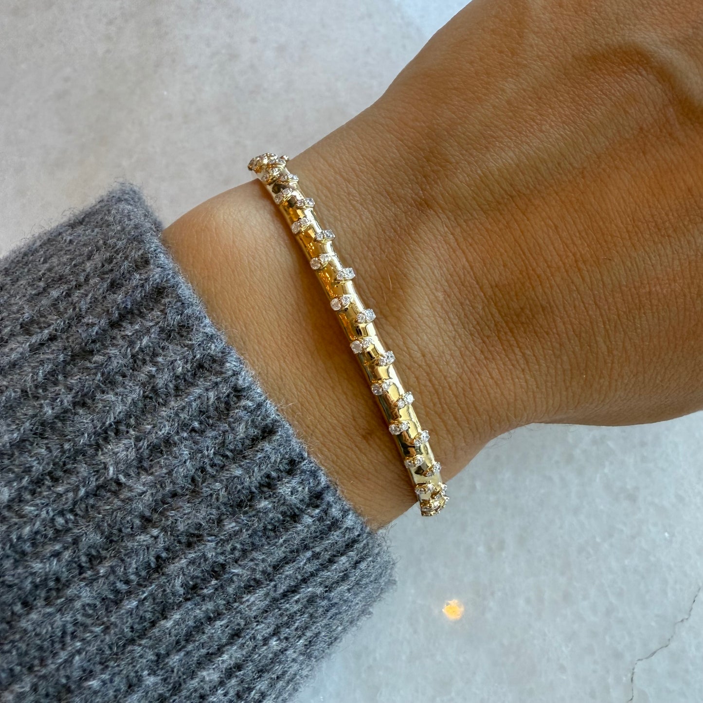 Gold Bangle With Pear Scattered Diamonds