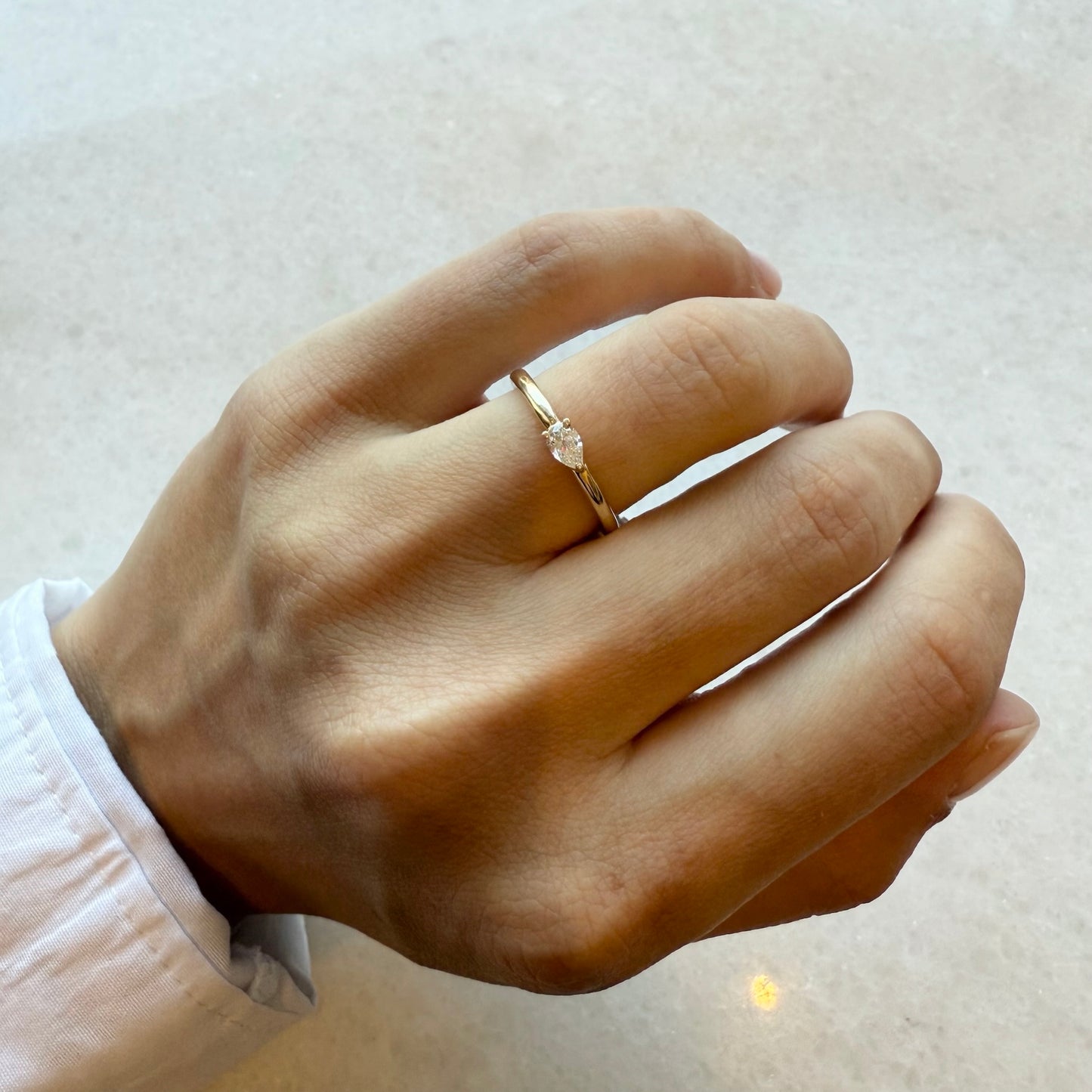 Gold Ring With Sideways Single Pear Diamond