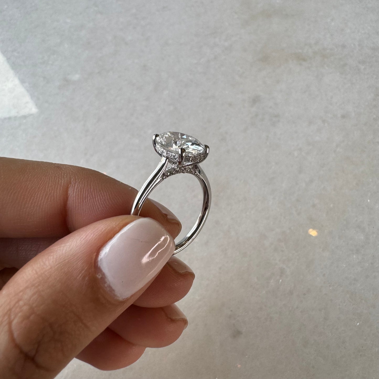 Oval Lab Grown Engagement Ring With Hidden Halo