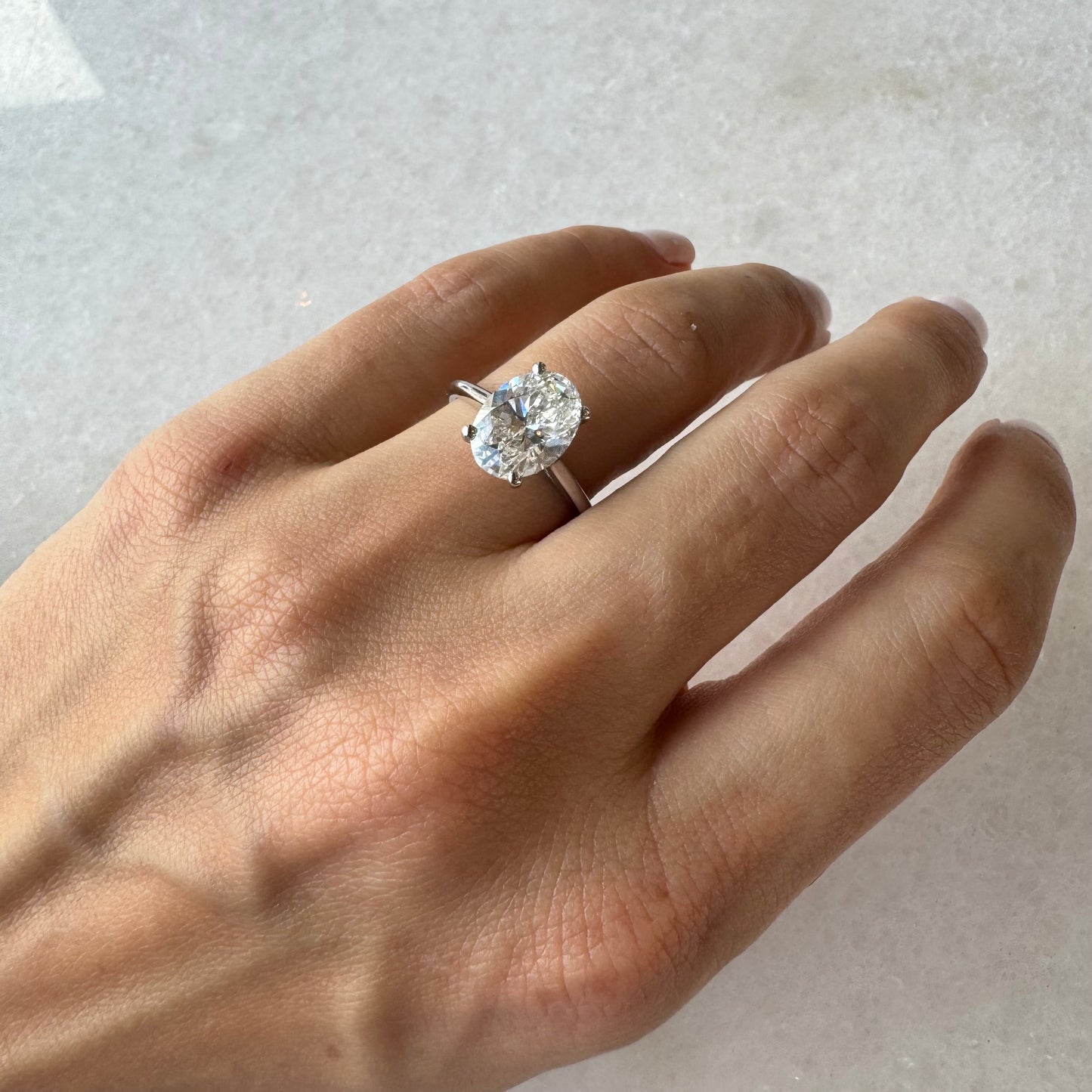 Oval Lab Grown Engagement Ring With Hidden Halo