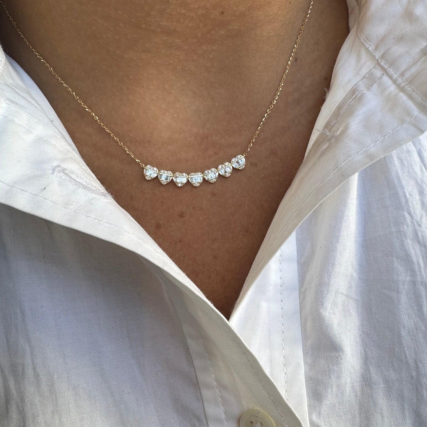 Curved 7 Diamond Cluster Hearts Necklace