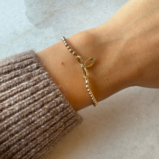 3 mm Stretch Ball Bracelet W Gold Bow