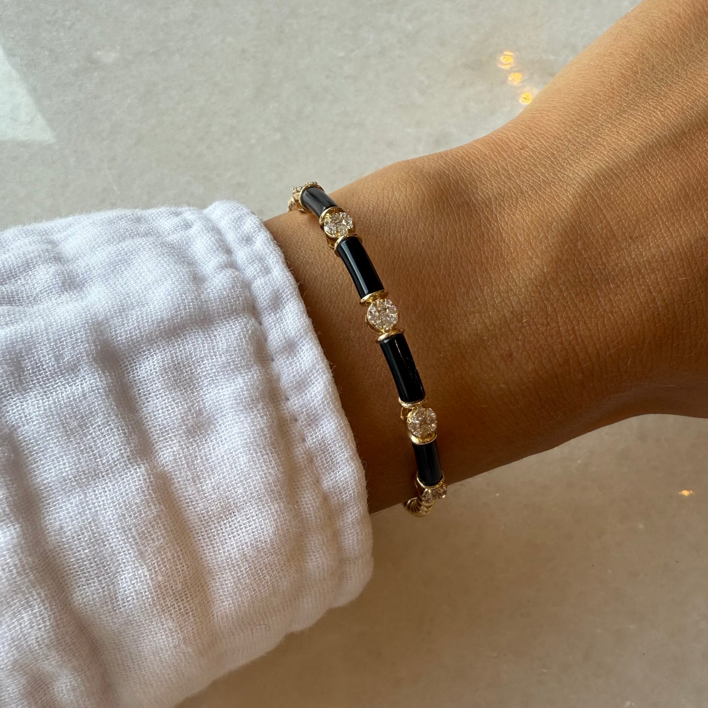 Onyx & 4 Station Diamond Ball Bangle